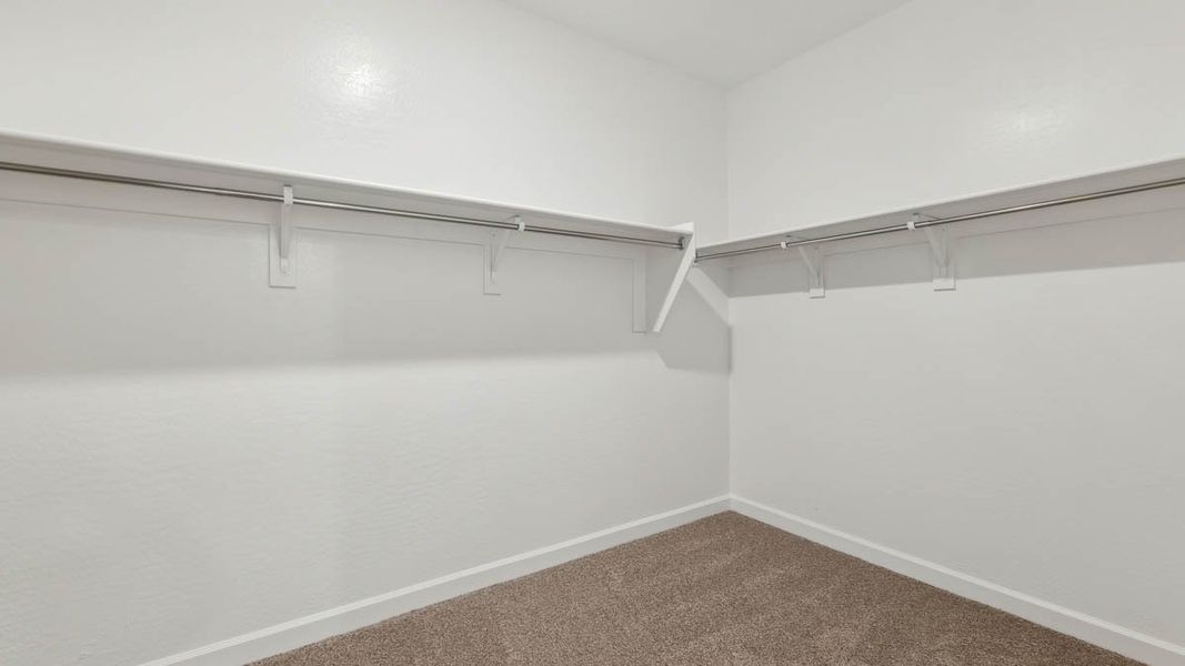 Spacious, unfurnished interior of a new home in Quail Ranch, San Tan Valley (Image 18).