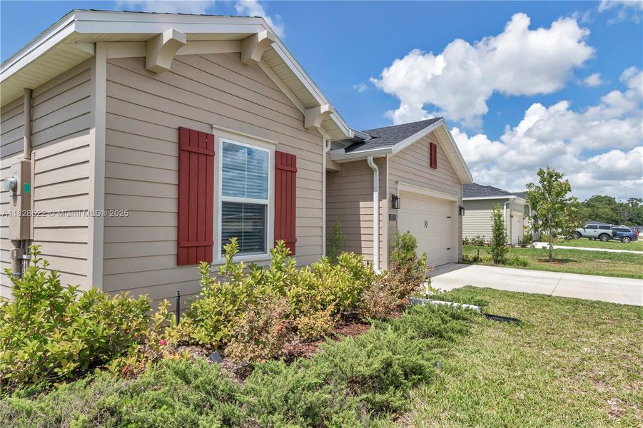 Front exterior of a new home in Country Lane Estates, Williston, FL, highlighting curb appeal (Image 2). Front exterior of a new home in Country Lane Estates, Williston, FL, highlighting curb appeal (Image 2).