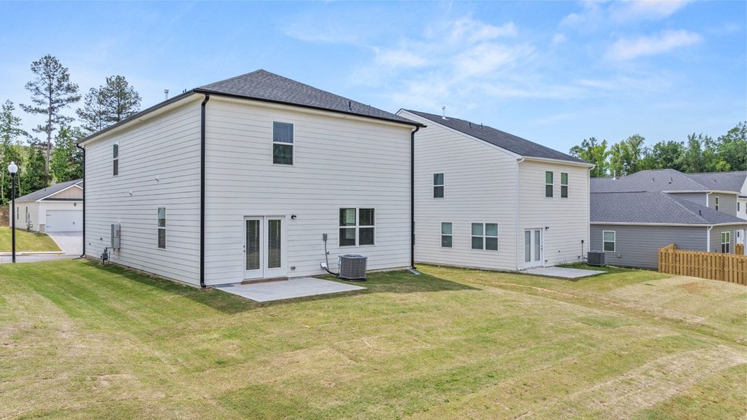 Exterior details and patio area of a home in The Islands, Beech Island (Image 20).