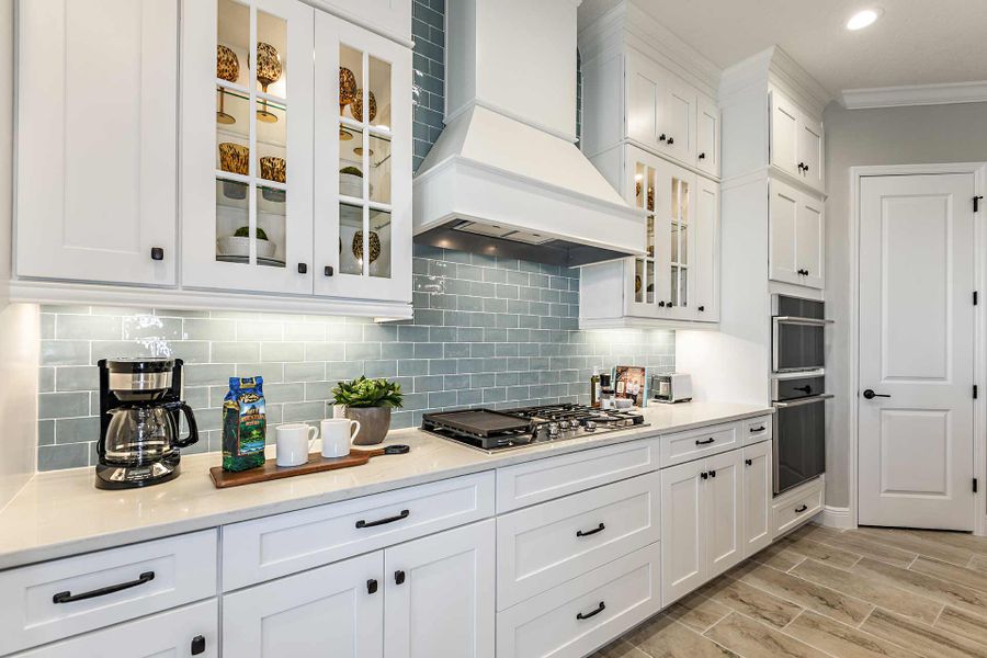 Representative furnished interior of a home built from the Kiawah 2 by Neal Communities in SkySail, Naples (Image 14).