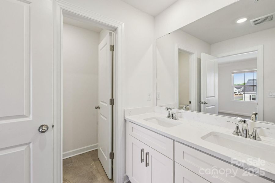 Photo is not of the actual home, but is an inspirational photo of builder’s model home and may depict options, furnishings, and/or decorator features that are not included