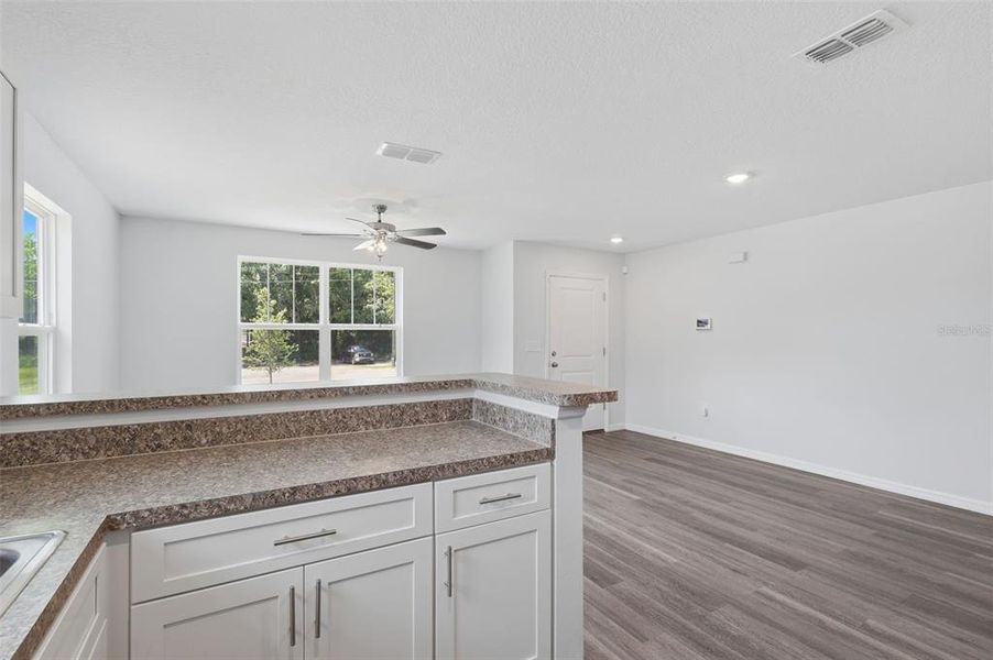 Furnished interior view inside a new home in , Apopka (Image 6).