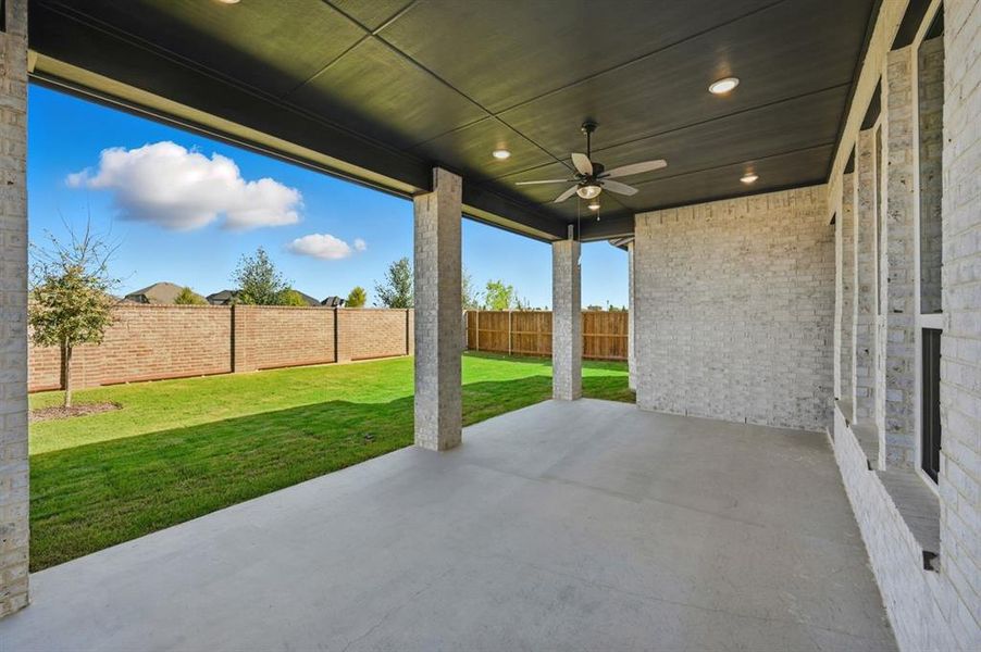 Exterior details and patio area of a home in Wellington: Artisan Series - 50ft lots, Haslet (Image 1).