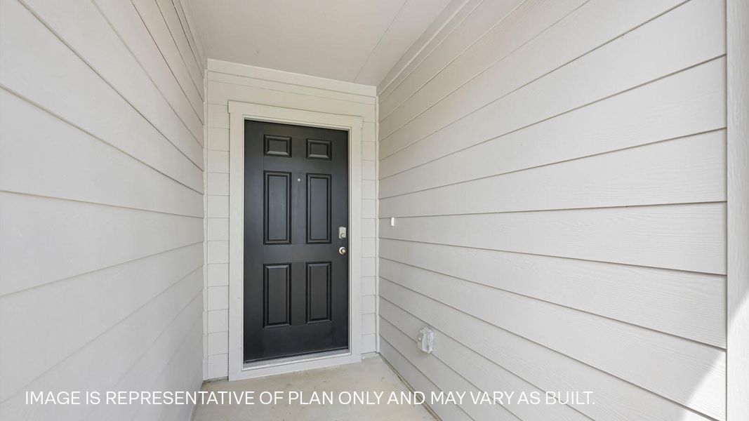 Exterior details and patio area of a home in Carillon, Manor (Image 15).