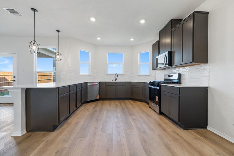 Furnished interior view inside a new home in Salerno - Heritage Collection, Round Rock (Image 7).