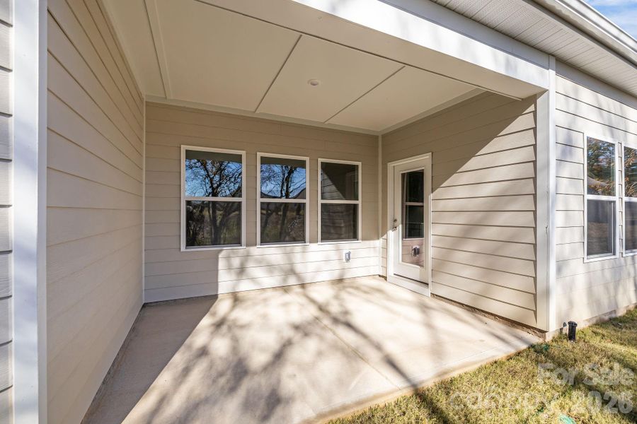 Exterior details and patio area of a home in Cottages at Wingate, Wingate (Image 18). Exterior details and patio area of a home in Cottages at Wingate, Wingate (Image 18).