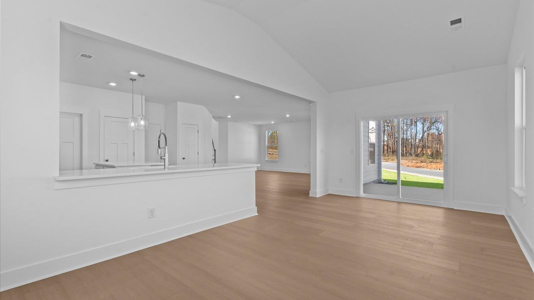 Exclusive living space with towering ceilings, tasteful finishes, and a warm, welcoming feel