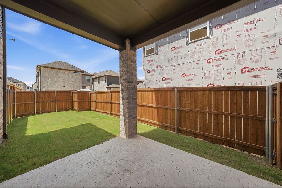 Exterior details and patio area of a home in Light Farms Brenham - 40' Lots, Celina (Image 3).