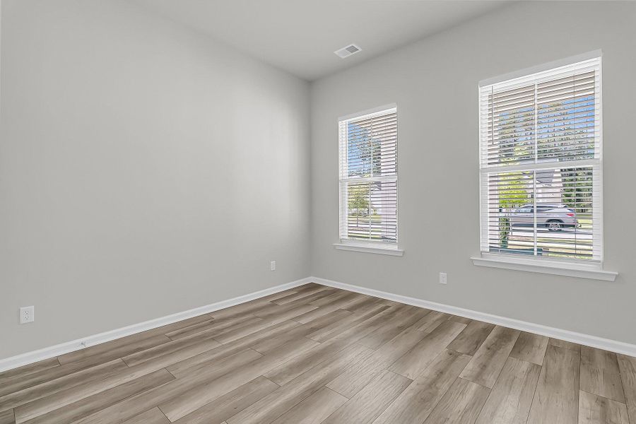 Spacious, unfurnished interior of a new home in Horizons at Summers Corner | 55+: The Legends, Summerville (Image 18).