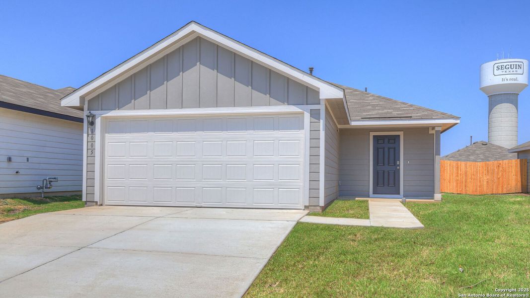 Front exterior of a new home in Navarro Fields, Seguin, TX, highlighting curb appeal (Image 2). Front exterior of a new home in Navarro Fields, Seguin, TX, highlighting curb appeal (Image 2).