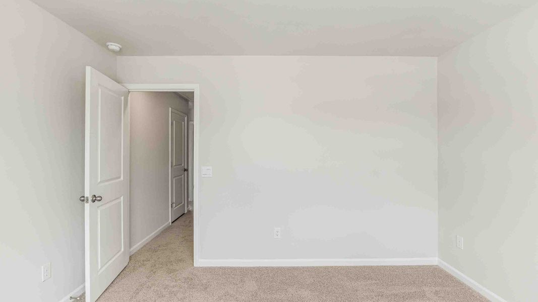 Spacious, unfurnished interior of a new home in Cedar Hill Landing, Navassa (Image 36). Spacious, unfurnished interior of a new home in Cedar Hill Landing, Navassa (Image 36).