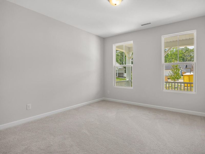 Spacious, unfurnished interior of a new home in Wellers Knoll, Lillington (Image 18).