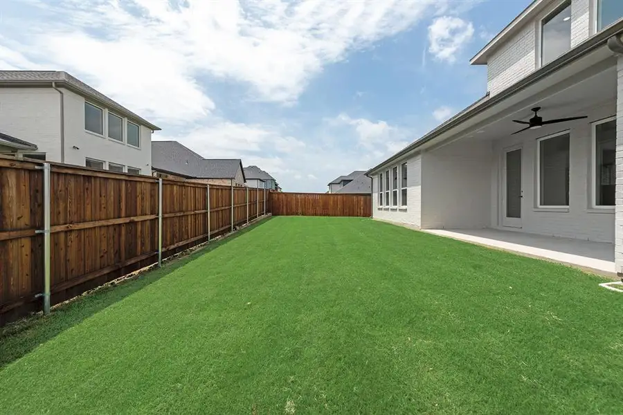 Exterior details and patio area of a home in Estates at Rockhill, Frisco (Image 3).