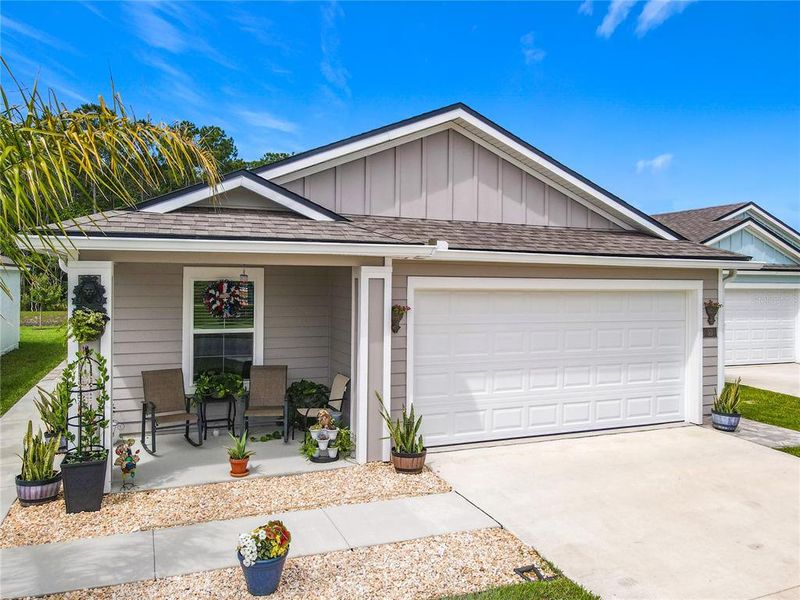 Front exterior of a new home in , Bunnell, FL, highlighting curb appeal (Image 20). Front exterior of a new home in , Bunnell, FL, highlighting curb appeal (Image 20).