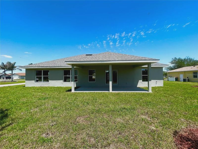 Exterior details and patio area of a home in Deep Creek, Punta Gorda (Image 3).