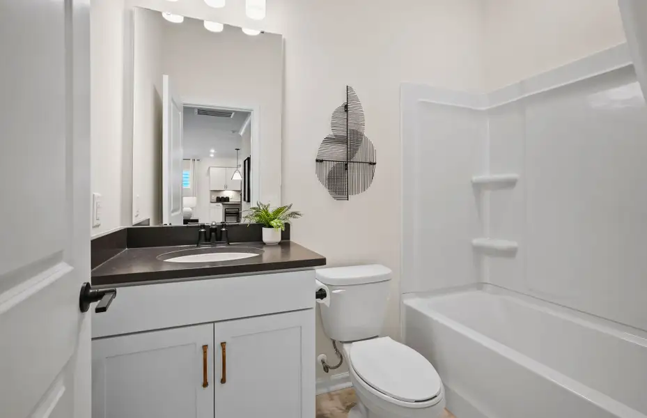 Furnished interior view inside a new home in Stewarts Landing, Charlotte (Image 4).