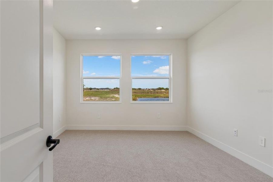 Spacious, unfurnished interior of a new home in Gracewater at Sarasota, Sarasota (Image 31).