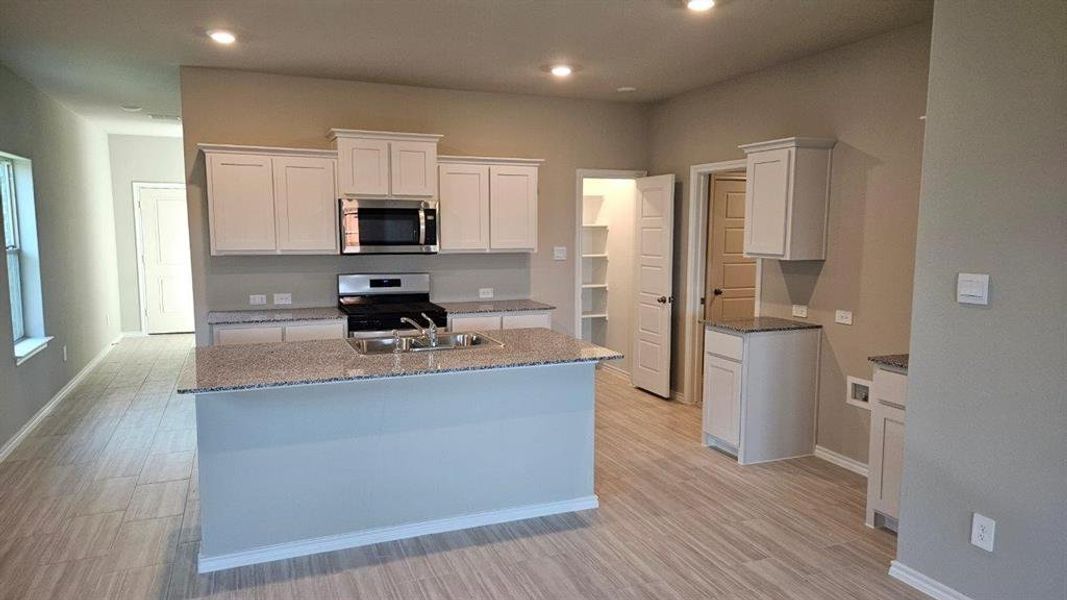 Furnished interior view inside a new home in Monarch at the Meadows, Ponder (Image 9). Furnished interior view inside a new home in Monarch at the Meadows, Ponder (Image 9).