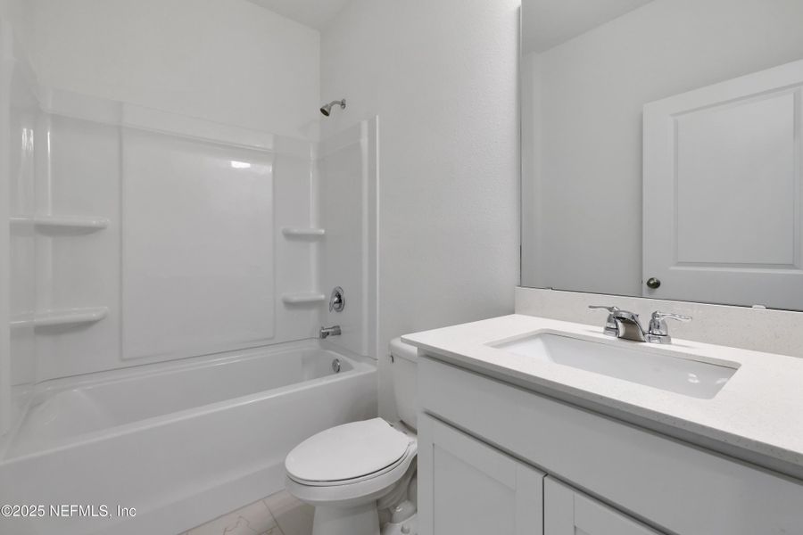 Furnished interior view inside a new home in Cordova Palms, St. Augustine (Image 10).