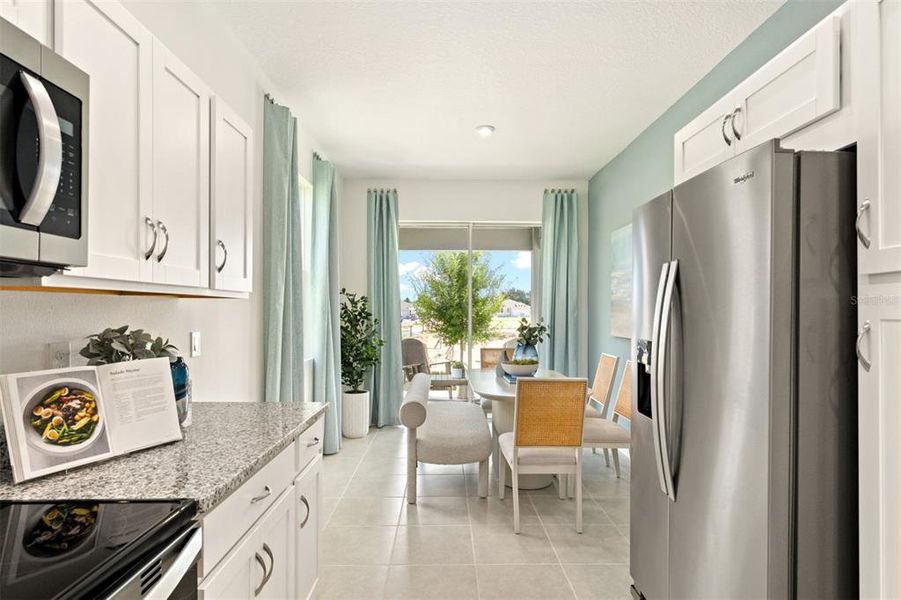 Furnished interior view inside a new home in Rainwood, Groveland (Image 8).