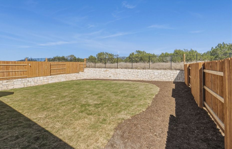 Exterior details and patio area of a home in West Cypress Hills, Spicewood (Image 23). Exterior details and patio area of a home in West Cypress Hills, Spicewood (Image 23).