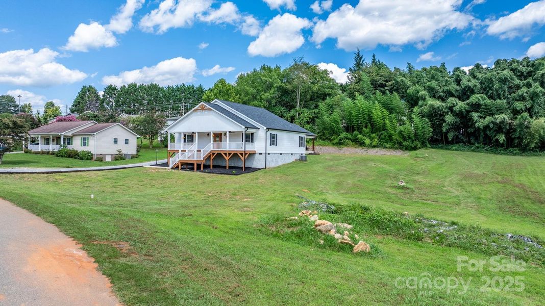 Front exterior of a new home in , Granite Falls, NC, highlighting curb appeal (Image 16).