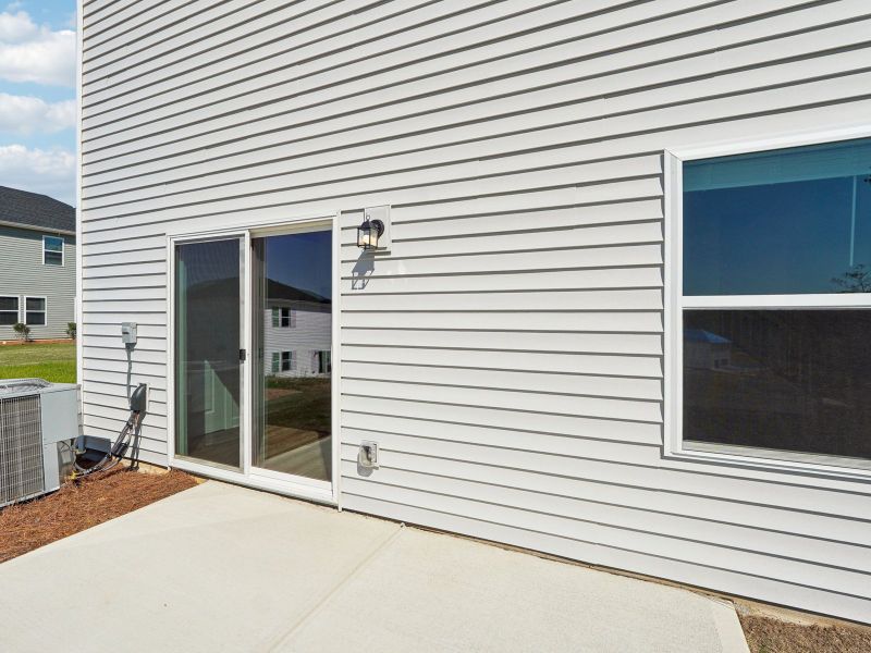 Enjoy a night under the stars on the customizable back patio.