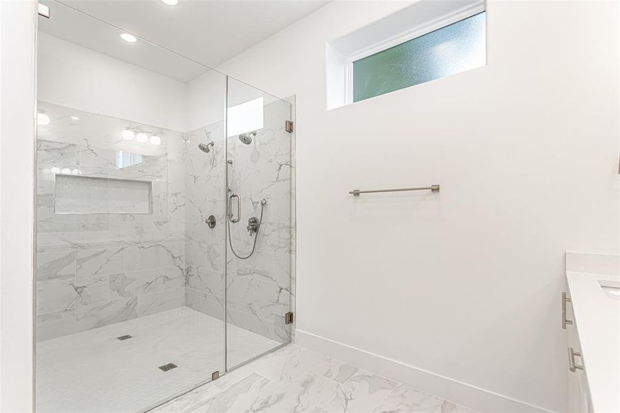 Full bathroom with vanity, baseboards, a marble finish shower, recessed lighting, and marble finish flooring