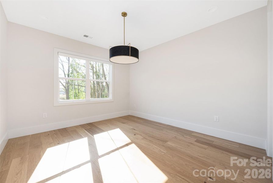 Upper-level guest bedroom 2.