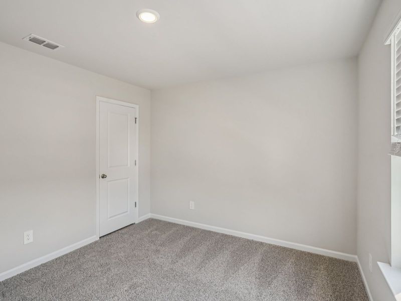 Spacious, unfurnished interior of a new home in Northwoods at Mirror Lake, Villa Rica (Image 18).