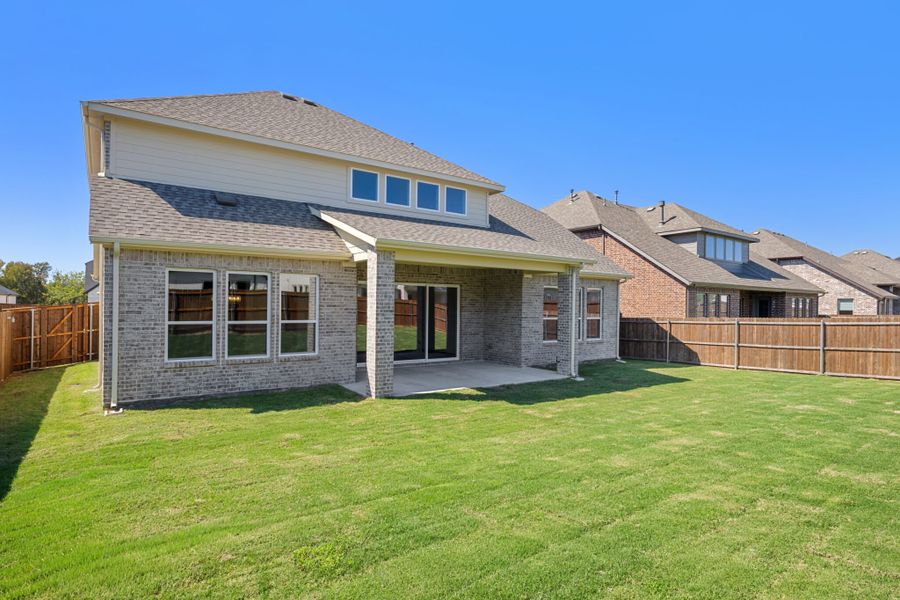 Exterior details and patio area of a home in Lake Breeze, Lavon (Image 26). Exterior details and patio area of a home in Lake Breeze, Lavon (Image 26).