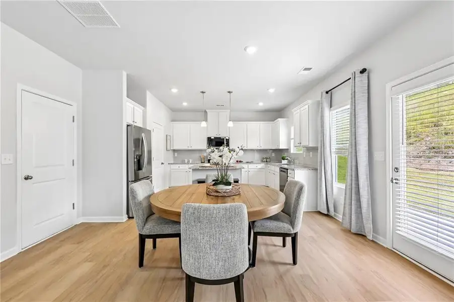 Furnished interior view inside a new home in The Hills at Cedar Creek, Winder (Image 11).