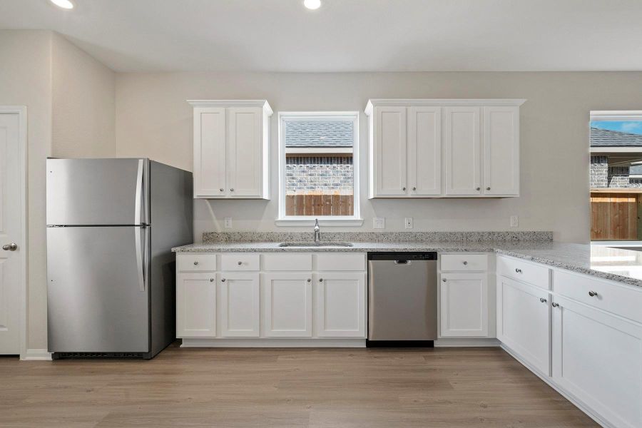 Furnished interior view inside a new home in Canterra Creek, Iowa Colony (Image 4).