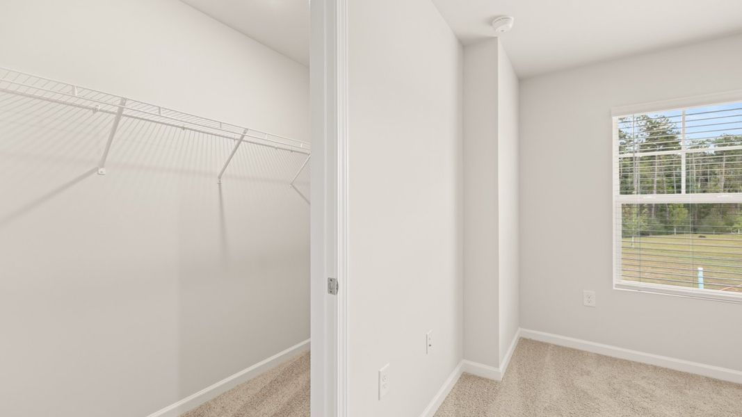 Spacious, unfurnished interior of a new home in Young's Crossing, Stone Mountain (Image 21).