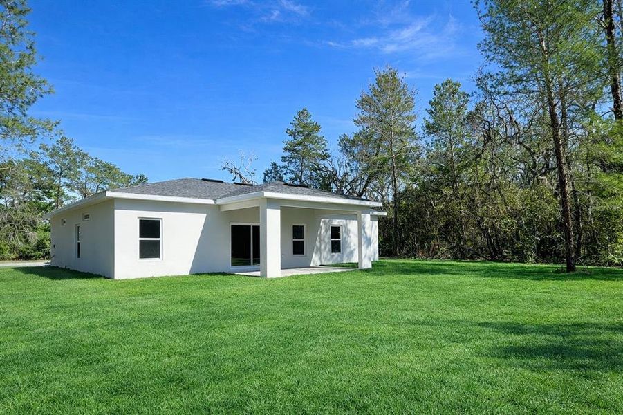 Exterior details and patio area of a home in , Ocala (Image 4).
