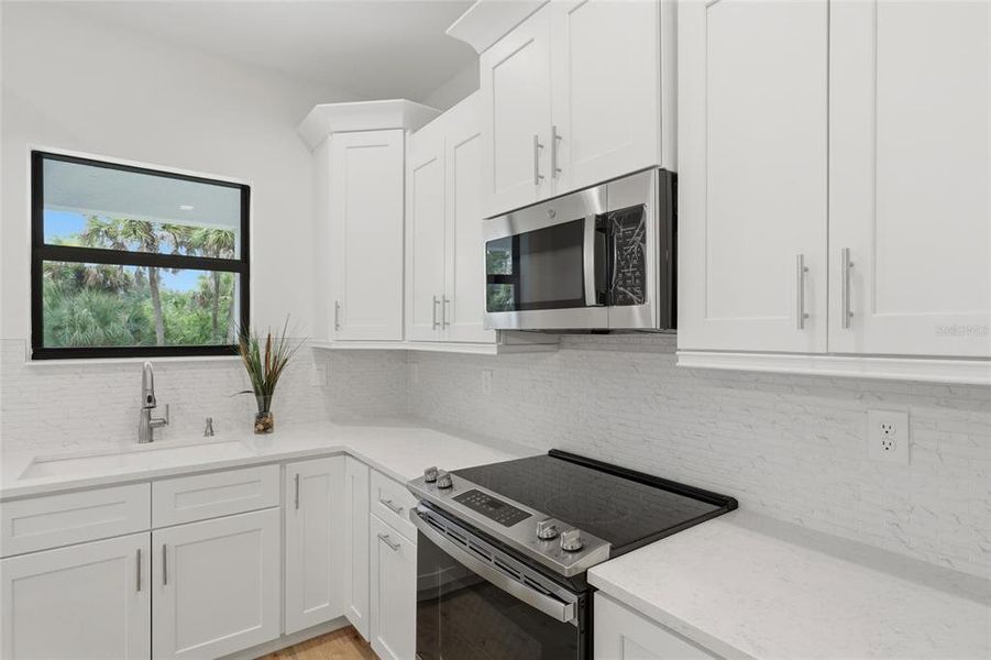Furnished interior view inside a new home in , Port Charlotte (Image 9).