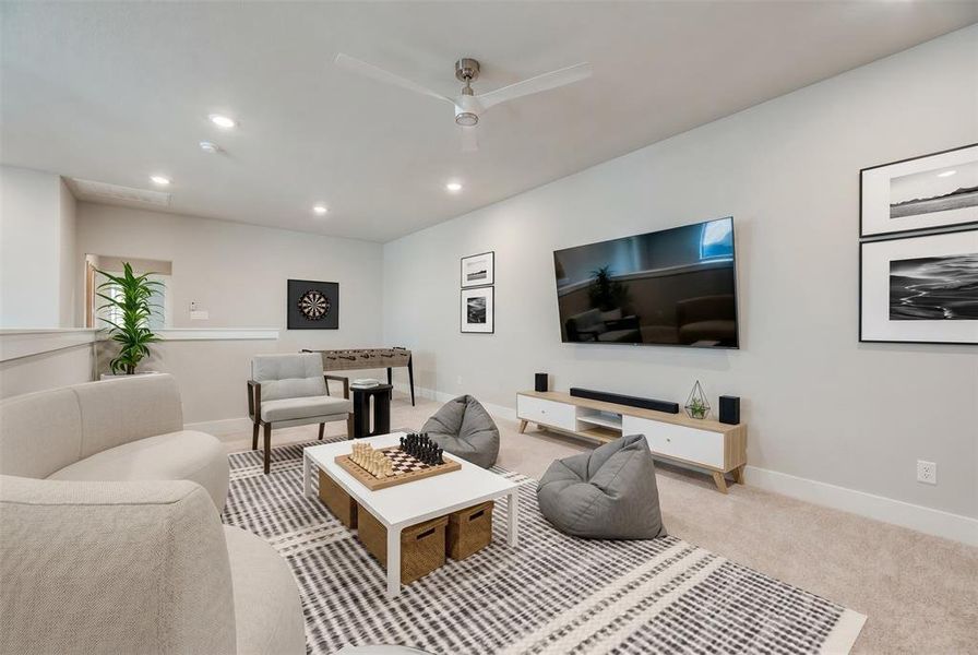 Spacious bonus room featuring neutral wall tones and recessed lighting