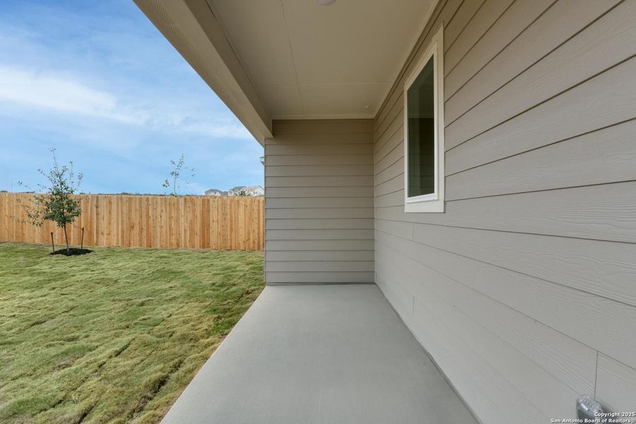 Exterior details and patio area of a home in The Arbors at the Wilder, Adkins (Image 4).