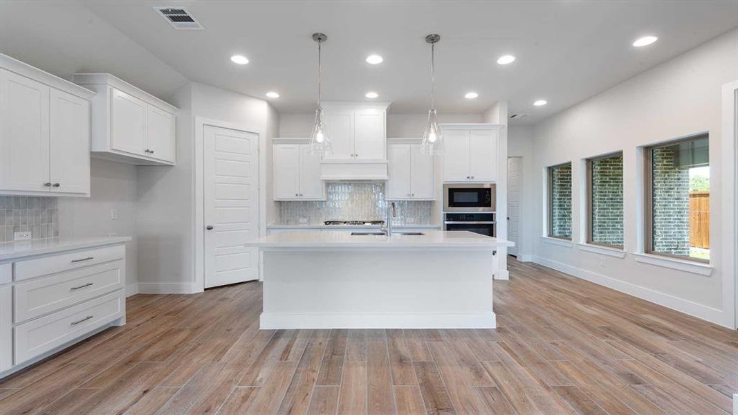 Furnished interior view inside a new home in The Heights At Uptown Celina 45', Celina (Image 5). Furnished interior view inside a new home in The Heights At Uptown Celina 45', Celina (Image 5).