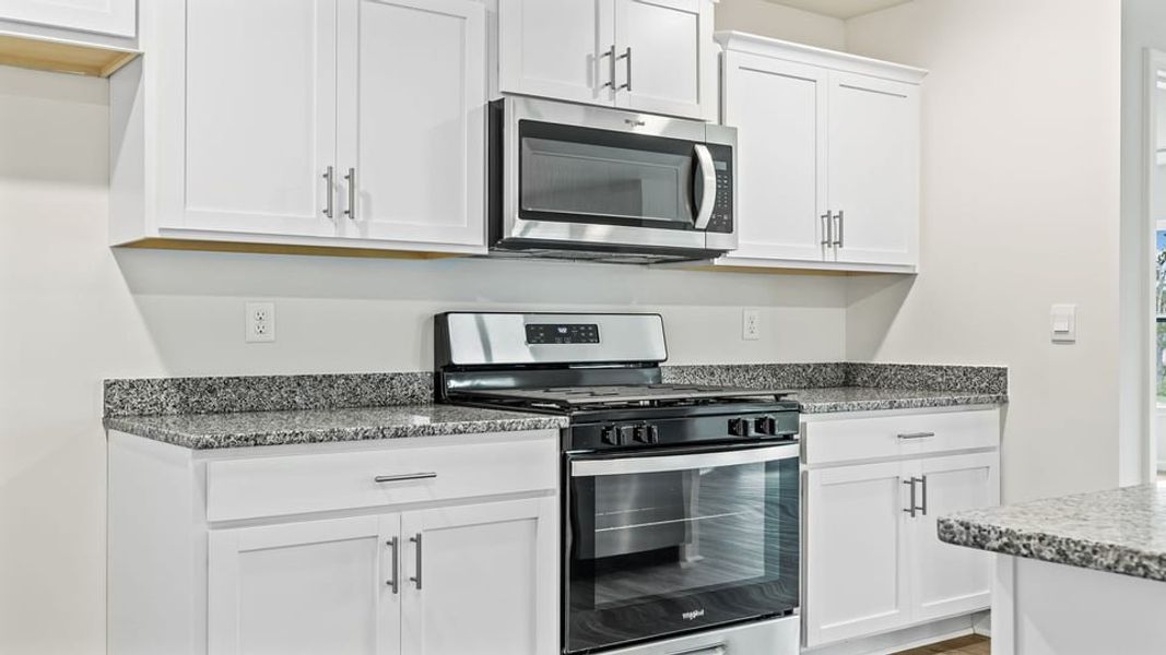 Furnished interior view inside a new home in Lakestone, Woodruff (Image 7).