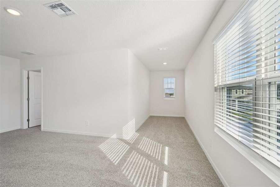 Spacious, unfurnished interior of a new home in Crosswinds - Classic Series, Haines City (Image 18).