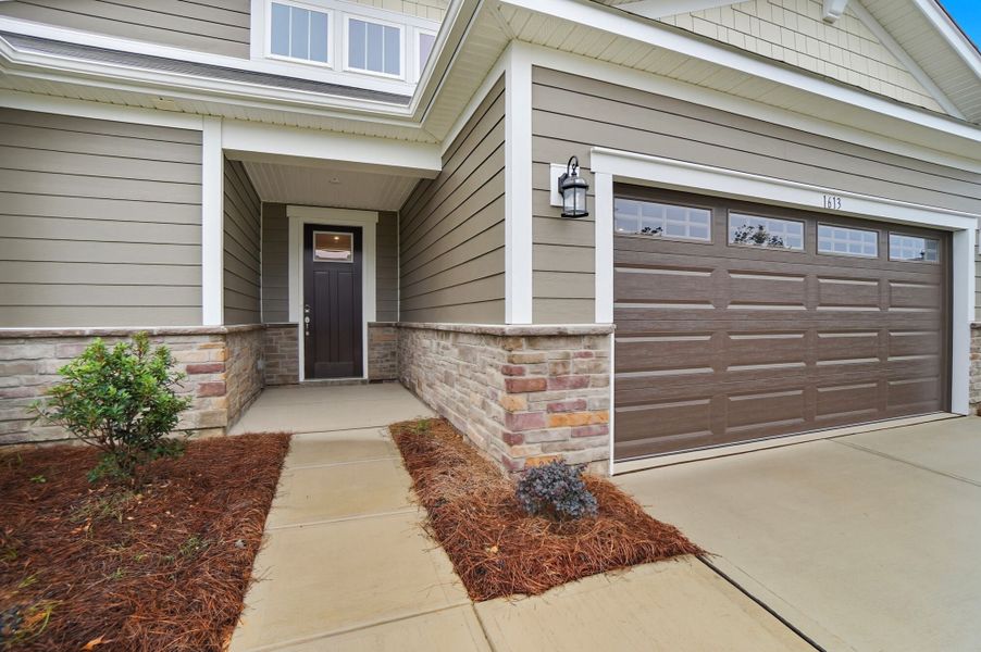 Exterior details and patio area of a home in Waxhaw Landing, Monroe (Image 2).