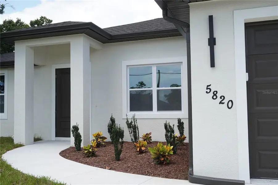 Exterior details and patio area of a home in , North Port (Image 38). Exterior details and patio area of a home in , North Port (Image 38).