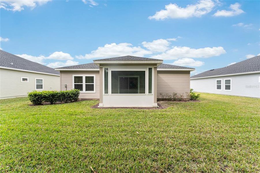 Exterior details and patio area of a home in Liberty Village: Liberty Village - Phase One, Ocala (Image 4).