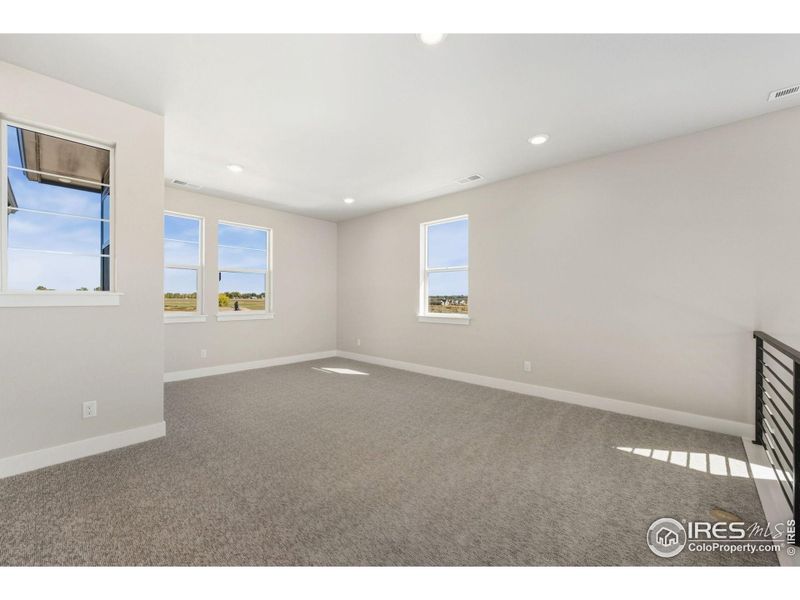 Spacious, unfurnished interior of a new home in Kitchel Lake at Serratoga Falls, Timnath (Image 11).