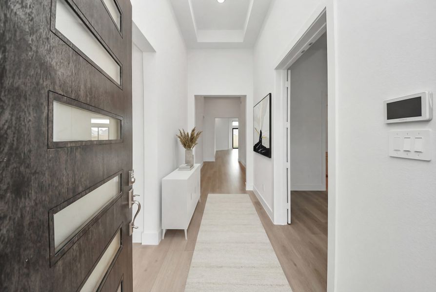 Furnished interior view inside a new home in ARTAVIA, Conroe (Image 7).
