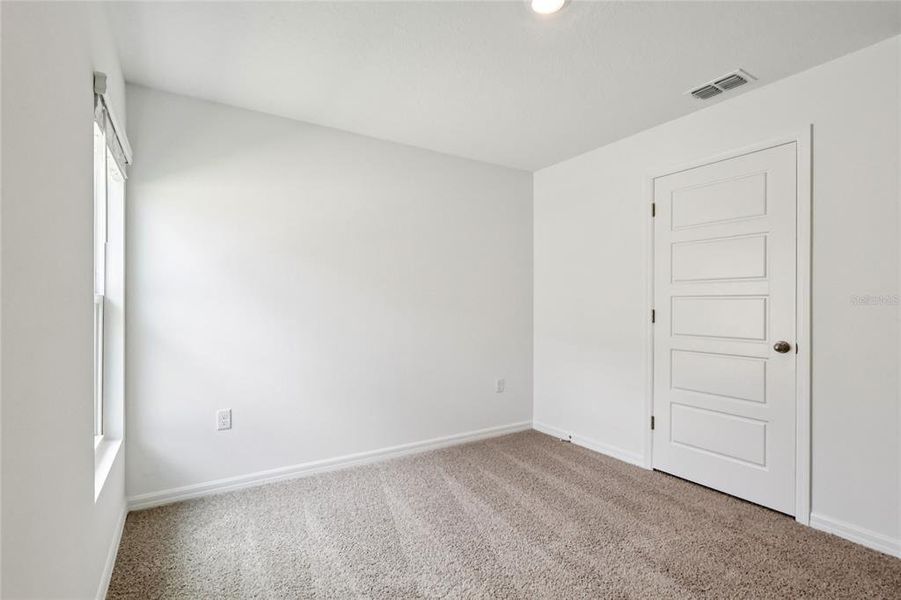 Spacious, unfurnished interior of a new home in Leoma's Landing, Lake Wales (Image 23).