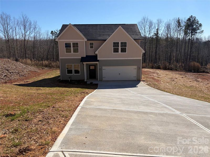 Front exterior of a new home in , Albemarle, NC, highlighting curb appeal (Image 1). Front exterior of a new home in , Albemarle, NC, highlighting curb appeal (Image 1).