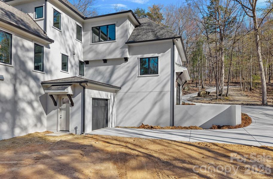 Exterior details and patio area of a home in , Mooresville (Image 24).