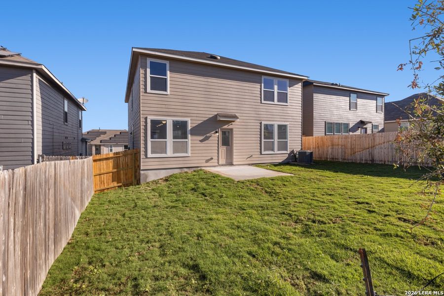 Exterior details and patio area of a home in Knox Ridge, Converse (Image 4).